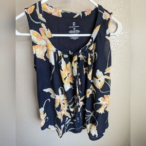 Navy sleeveless blouse with floral pattern